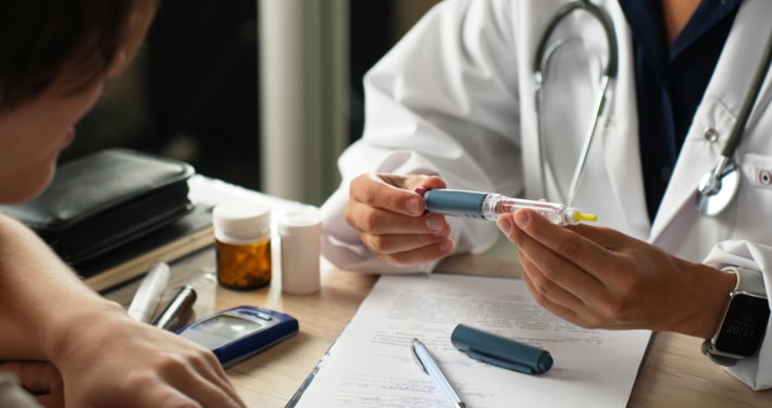 doctor holding semaglutide drug
